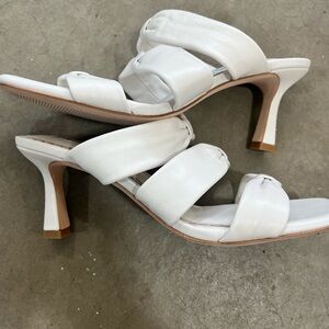 White 3 strap leather heels.